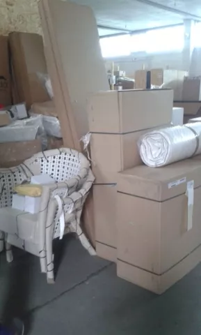 Household furniture and appliances ready for international relocation